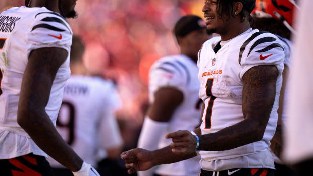 Cincinnati Bengals wide receiver Ja'Marr Chase (1) talks with Cincinnati Bengals wide receiver Tee Higgins (5) in the fourth quarter of the NFL game between the Cincinnati Bengals and the San Francisco 49ers at Levi Stadium in Santa Clara, Calif., on Sunday, Oct 29, 2023.